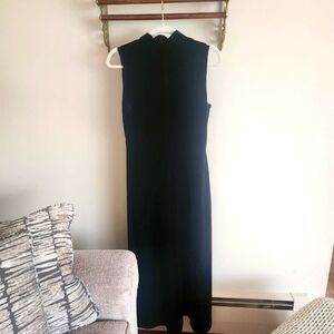 Long black, sleeveless velvet dress by Ronnie Nicole